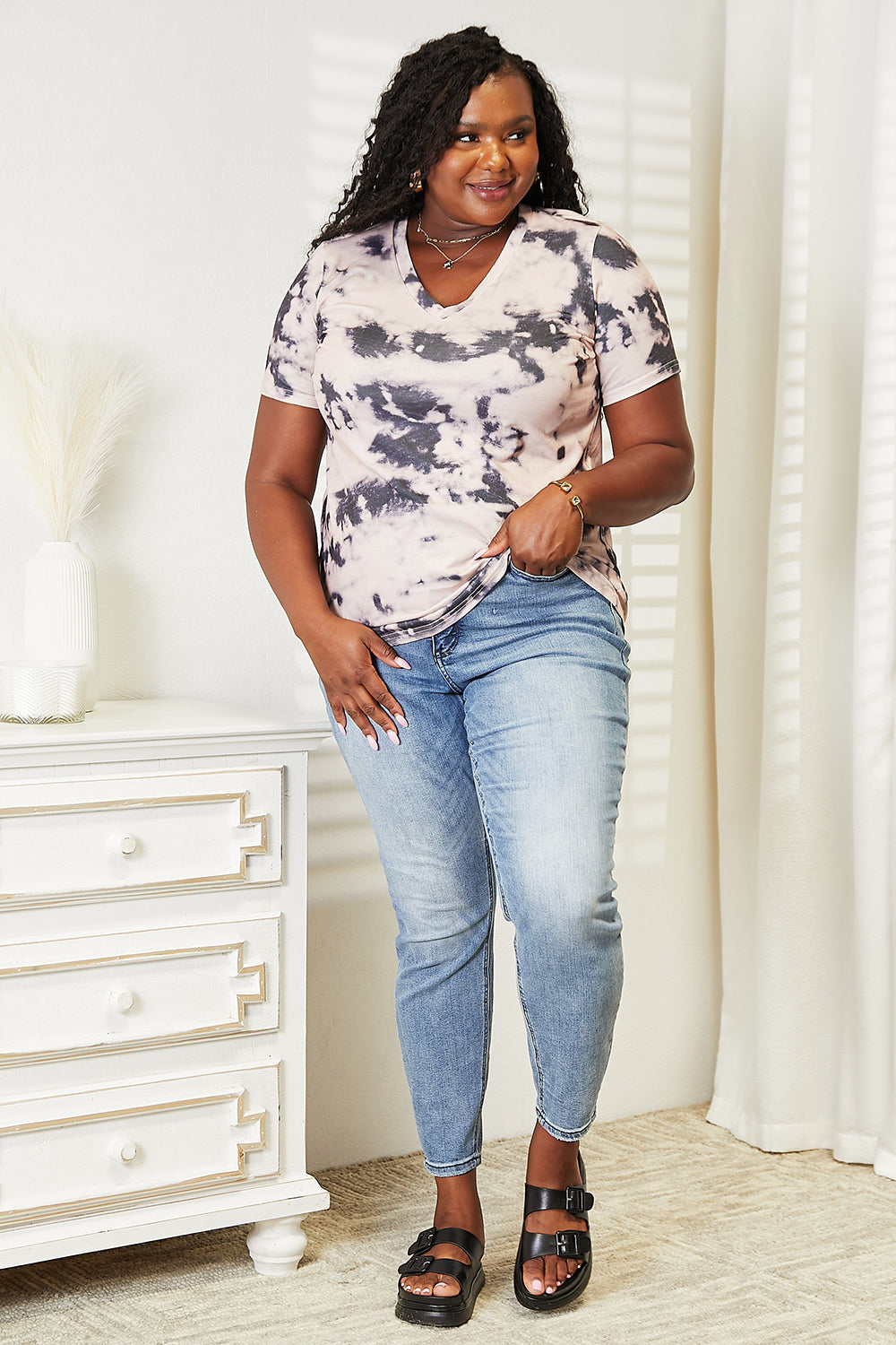 Watermelon pink tie dye tee shown on a curve model