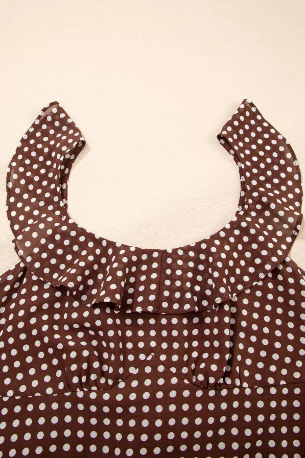 Caramel polka dot backless tiered maxi dress, three quarter view