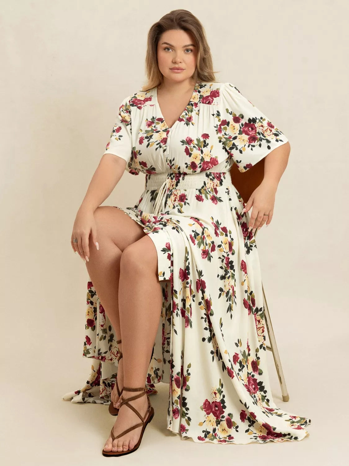 Pastel yellow floral flutter sleeve button front maxi dress detail of the fabric and print
