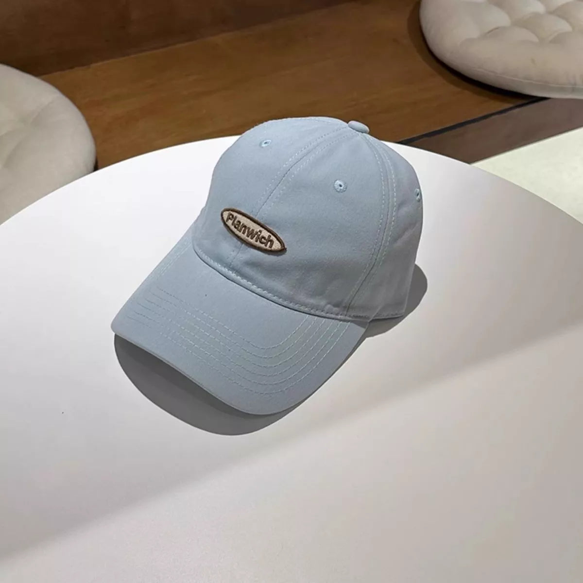Light blue casual cap shown from the side
