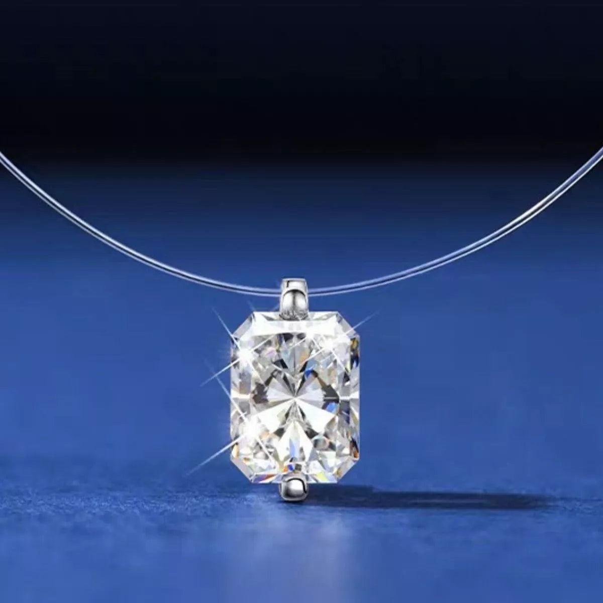 Sterling silver moissanite necklace laid flat