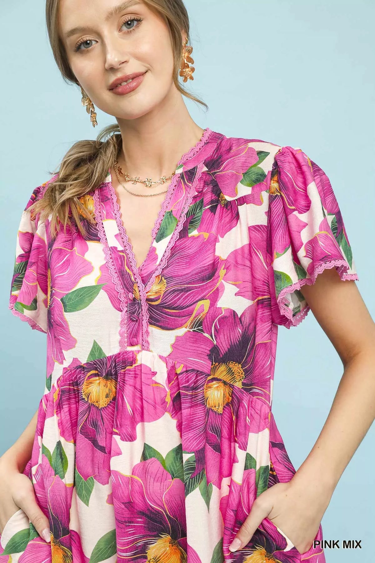 Pink tropical floral v neck flutter sleeve tiered midi dress detail view