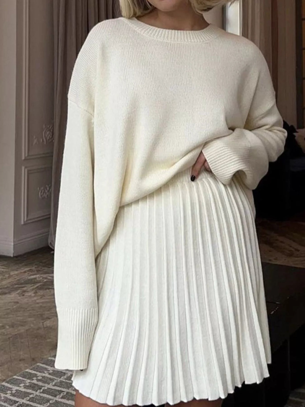 Round neck top and pleated skirt sweater set front view
