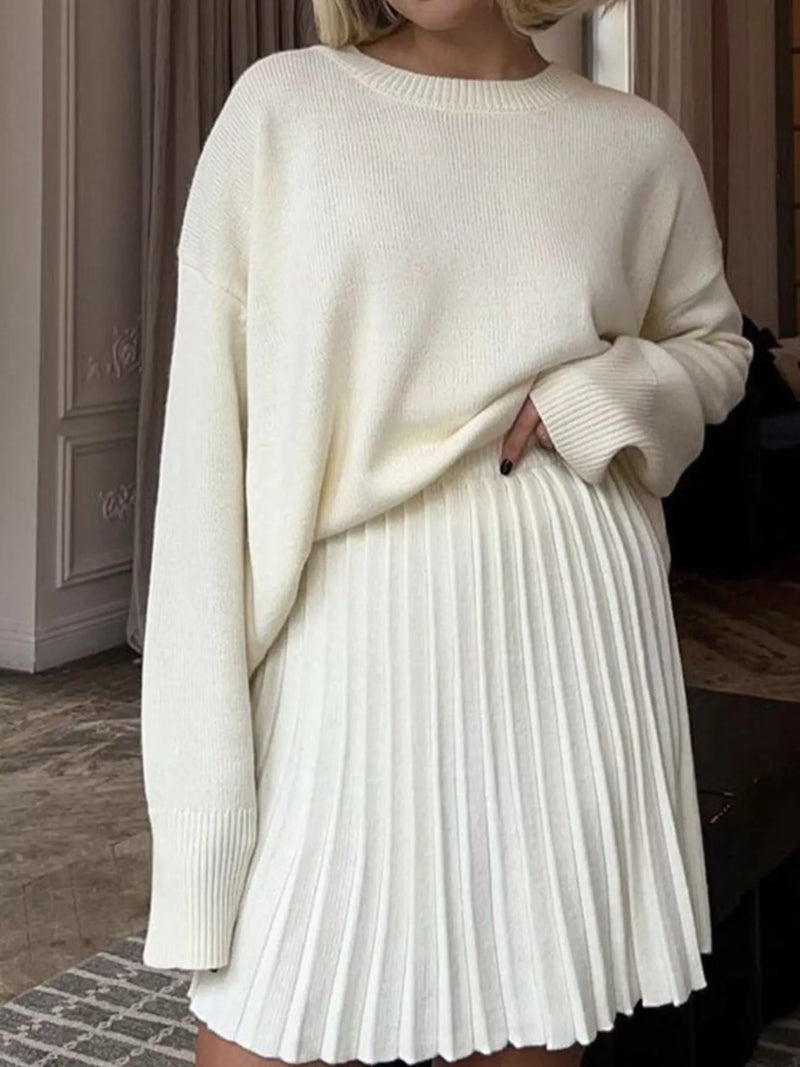 Round neck top and pleated skirt sweater set front view
