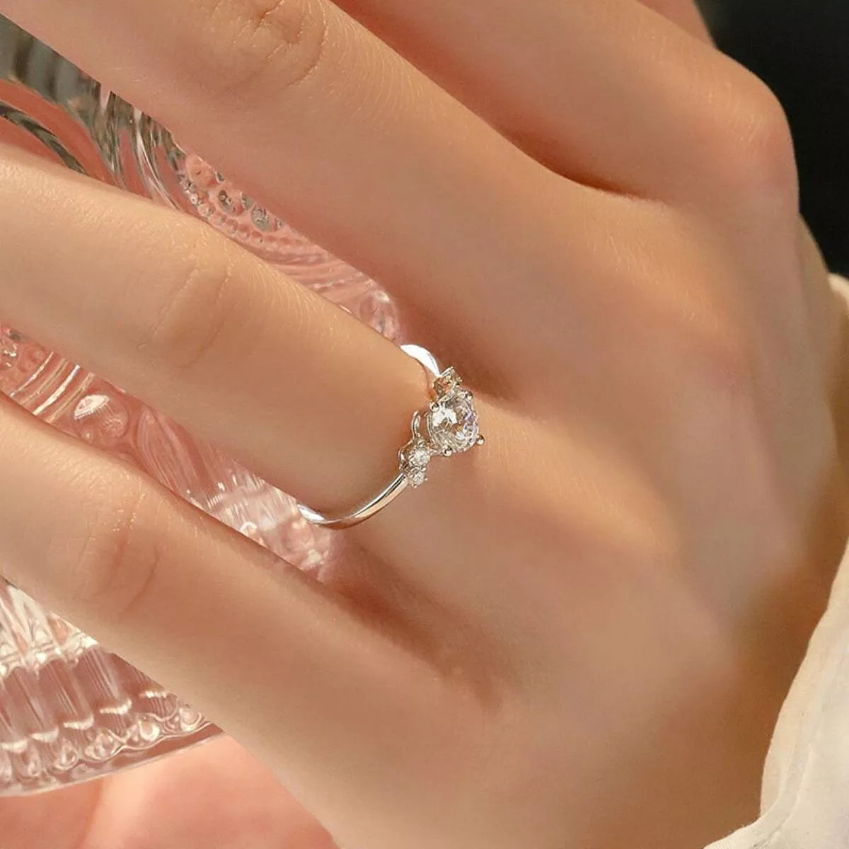 Adjustable moissanite ring worn on the hand