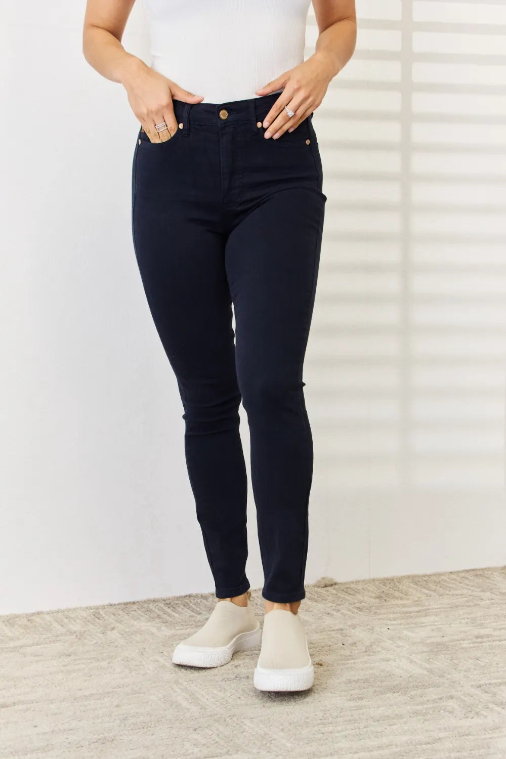 Judy Blue navy garment dyed skinny jeans front view