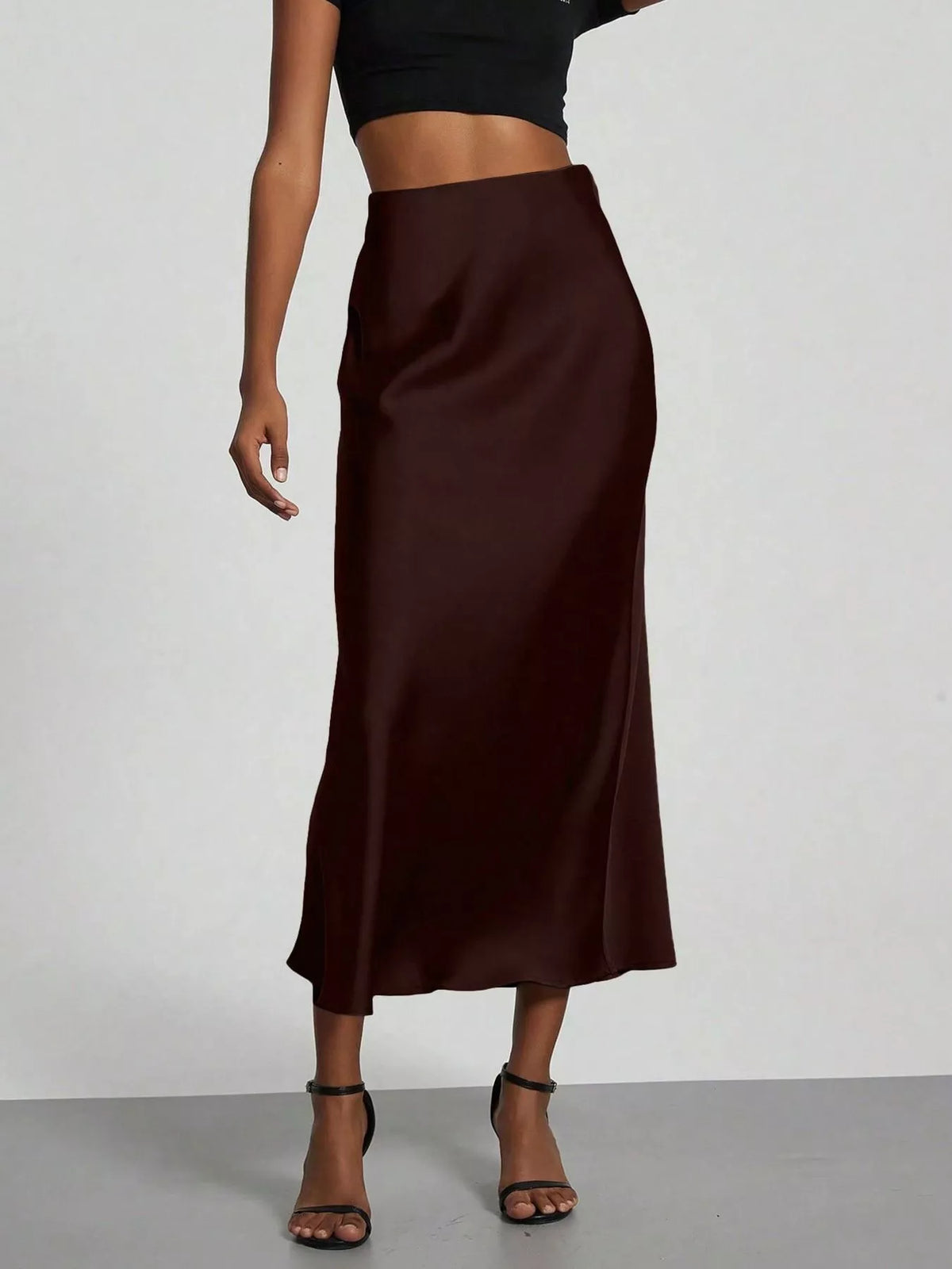 Satin midi skirt styled with a simple top