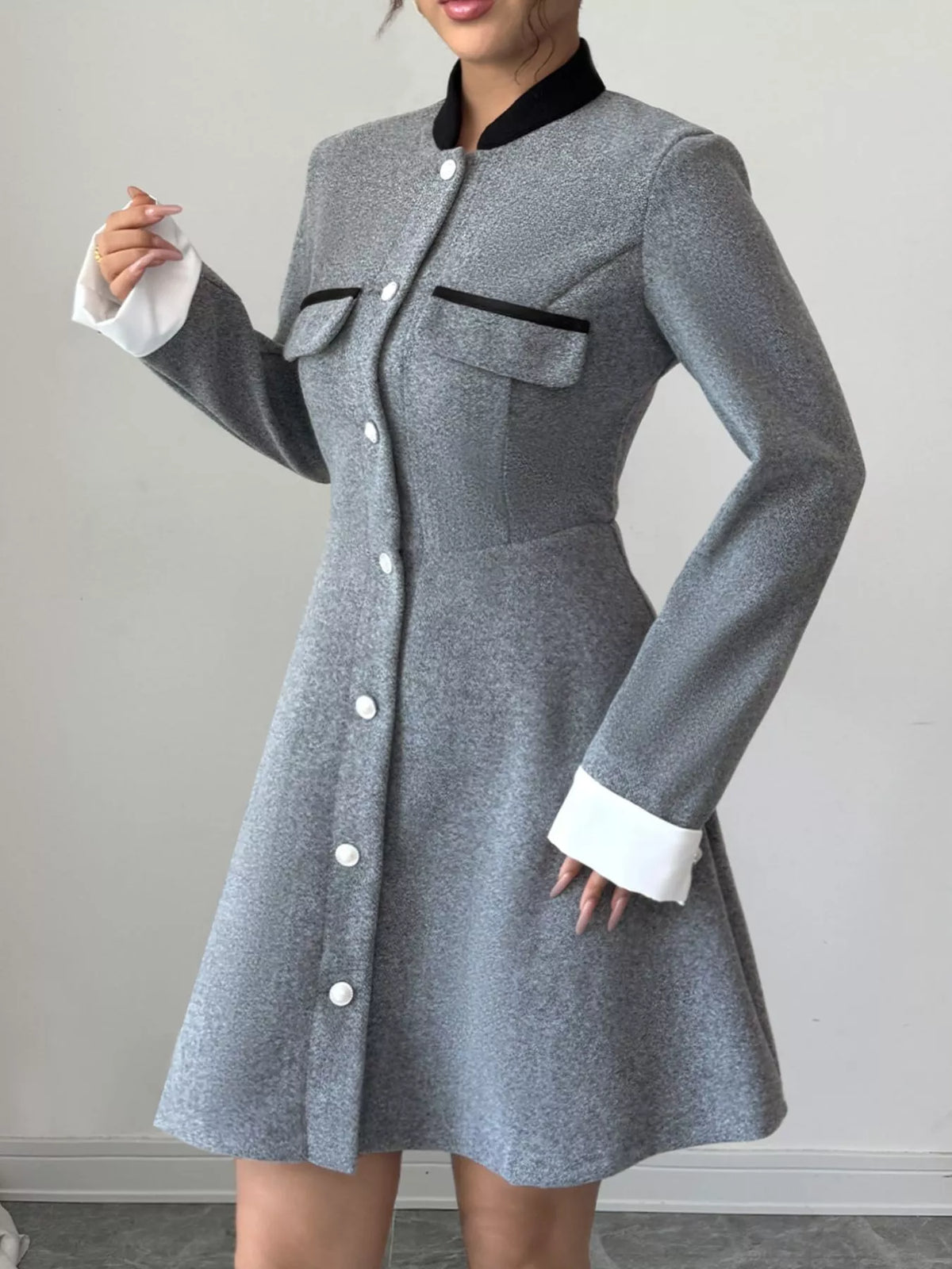 a line long sleeve button down dress in gray back view