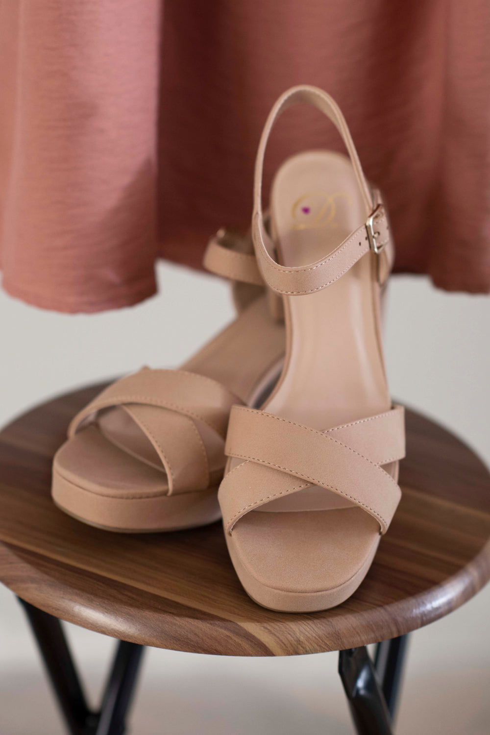 Block heel sandal shown worn on foot
