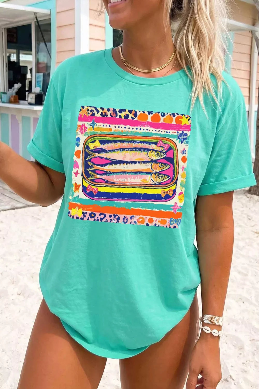 Full view of the relaxed fit graphic tee on a model