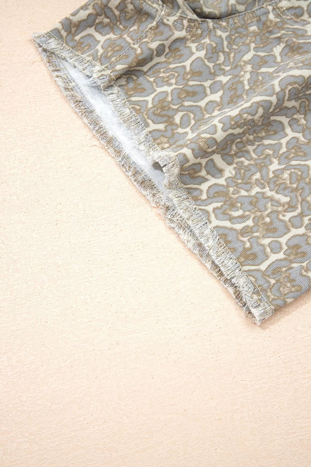 Khaki leopard print raw edge denim shorts side view