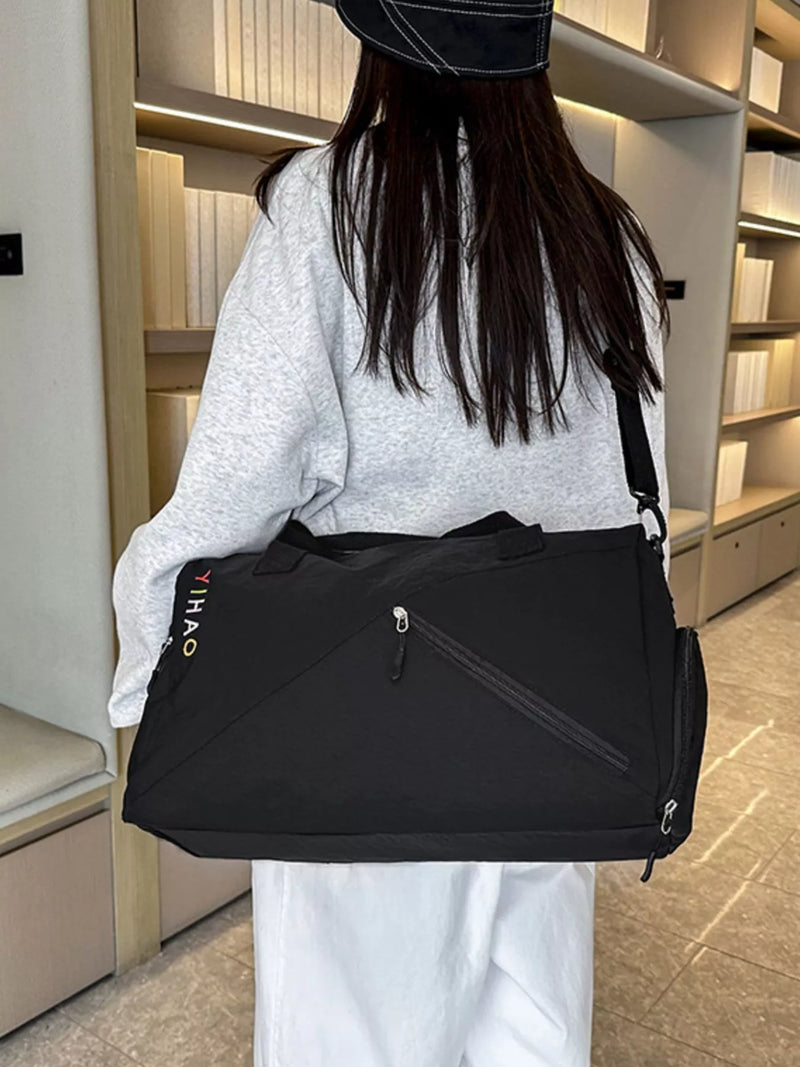 Black large capacity nylon travel duffel bag front view
