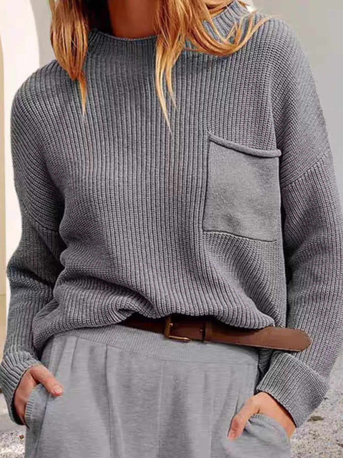 pocket detail dropped shoulder ribbed sweater close up of the neckline