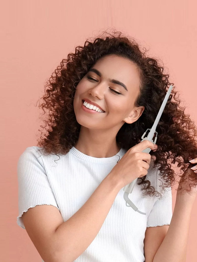 Interchangeable barrel curling iron with handle