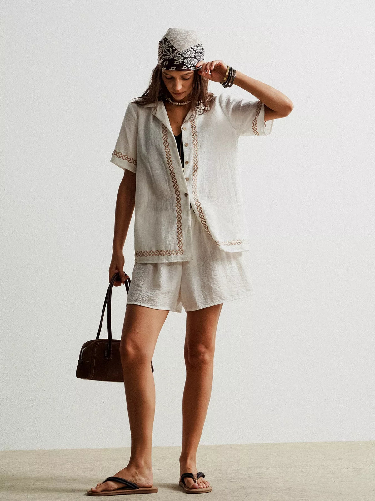 White two piece set styled with accessories