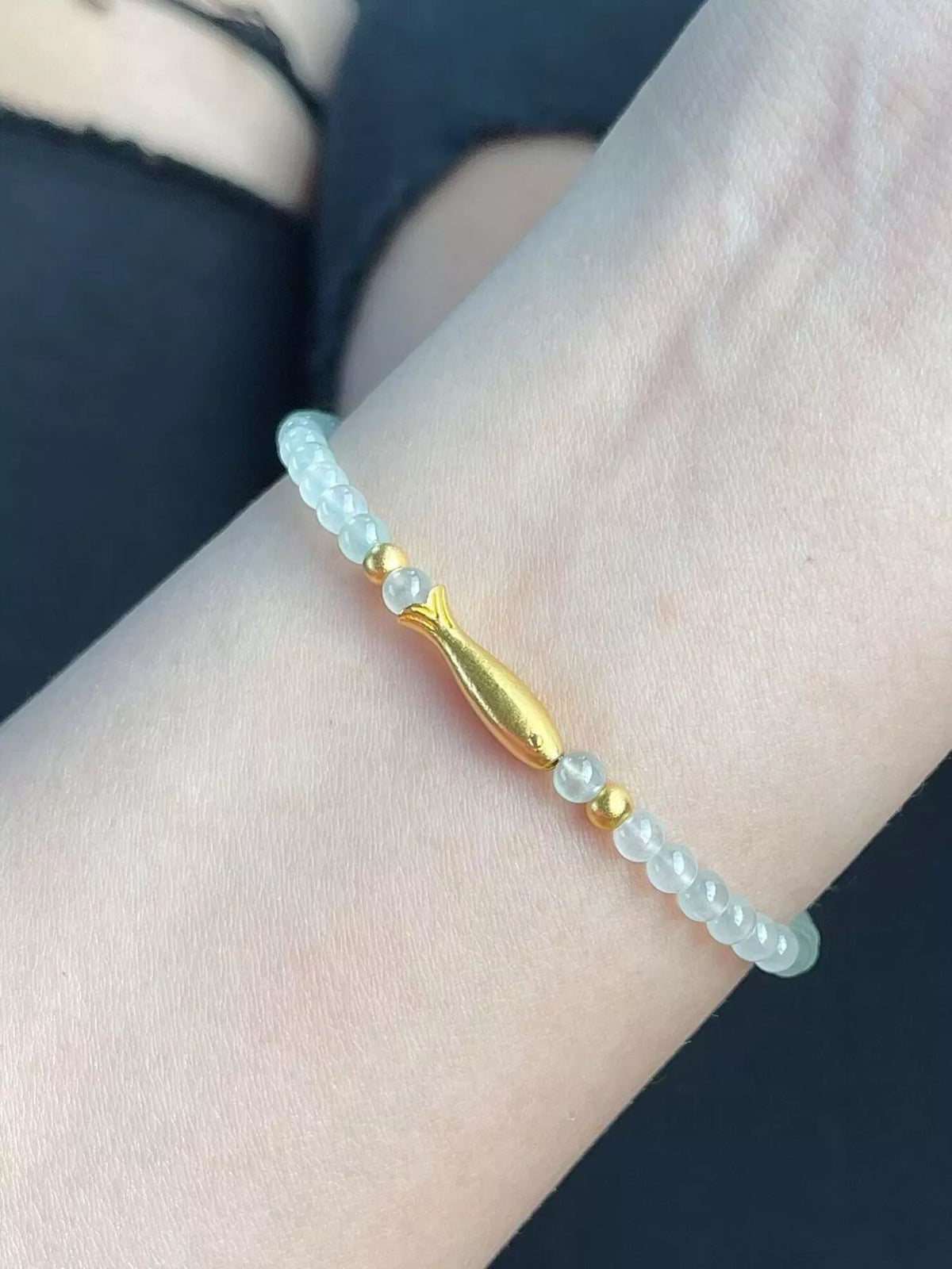 Fish beaded bracelet laid flat