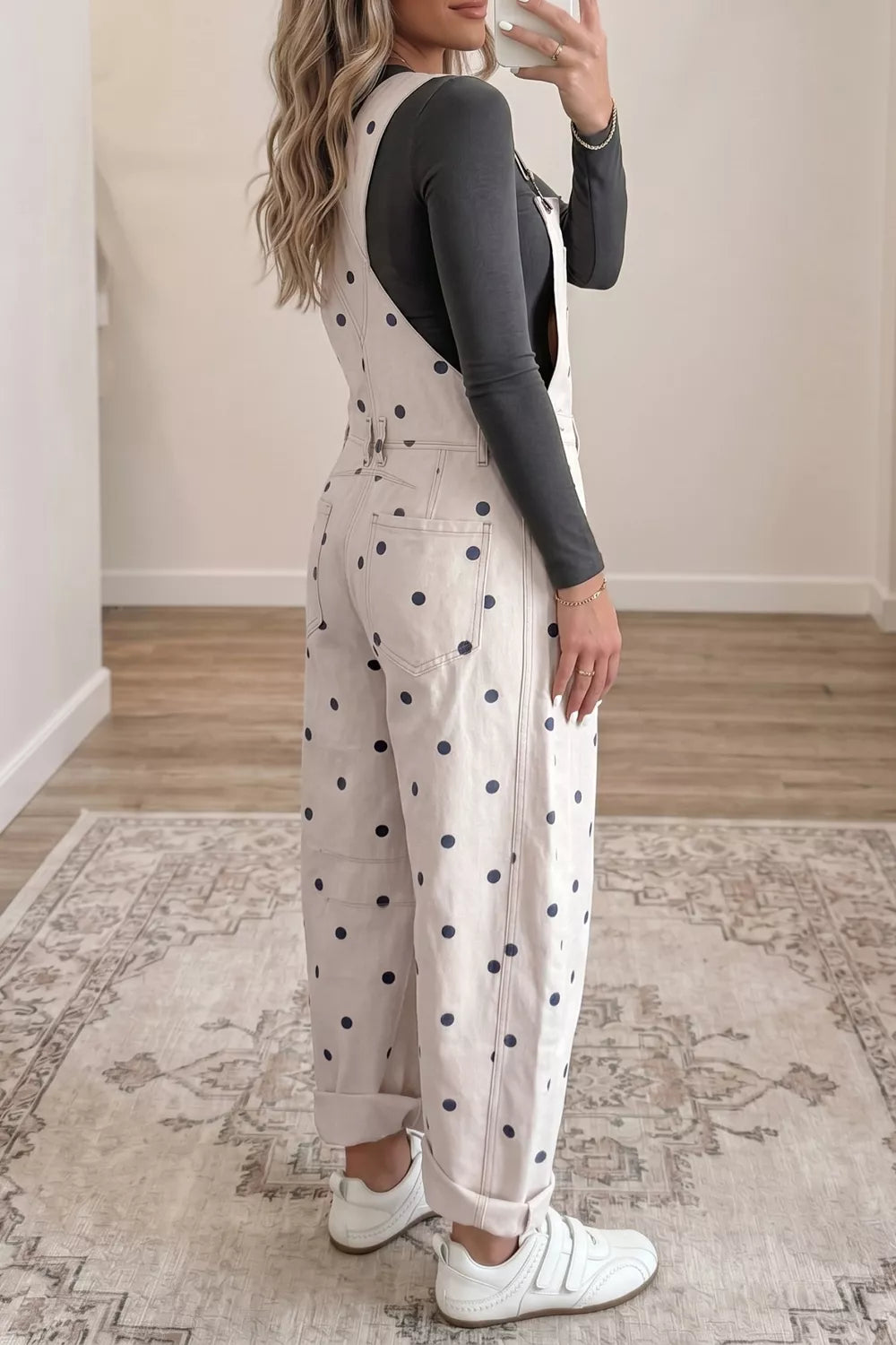 Denim jumpsuit bib front button detail