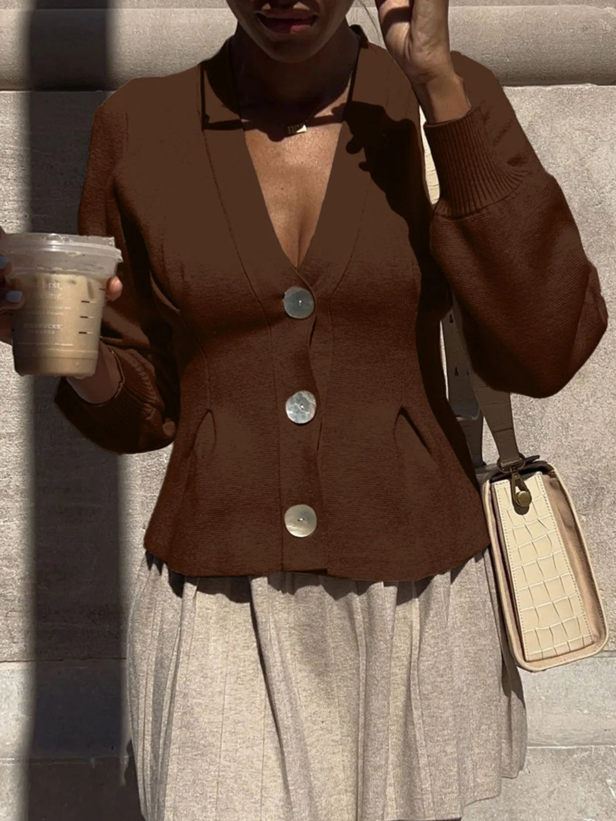 Button up V neck ruffle knit cardigan close up