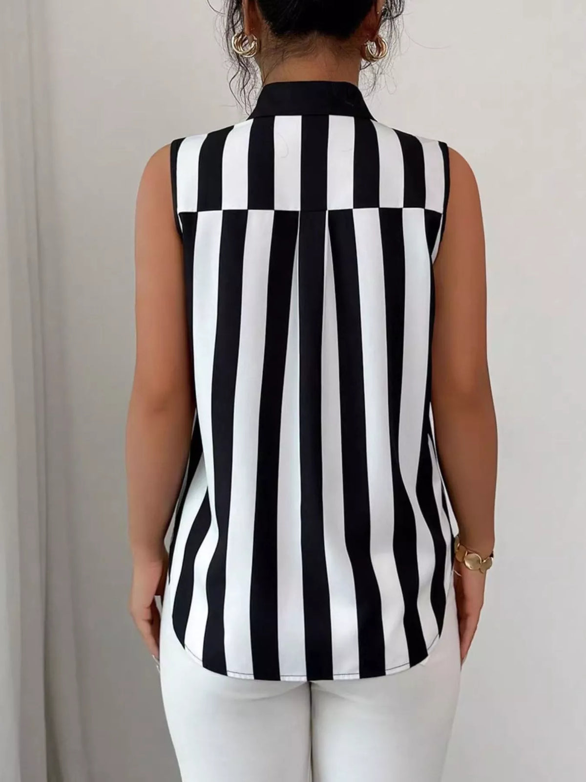 Button up sleeveless shirt in one of five available colors