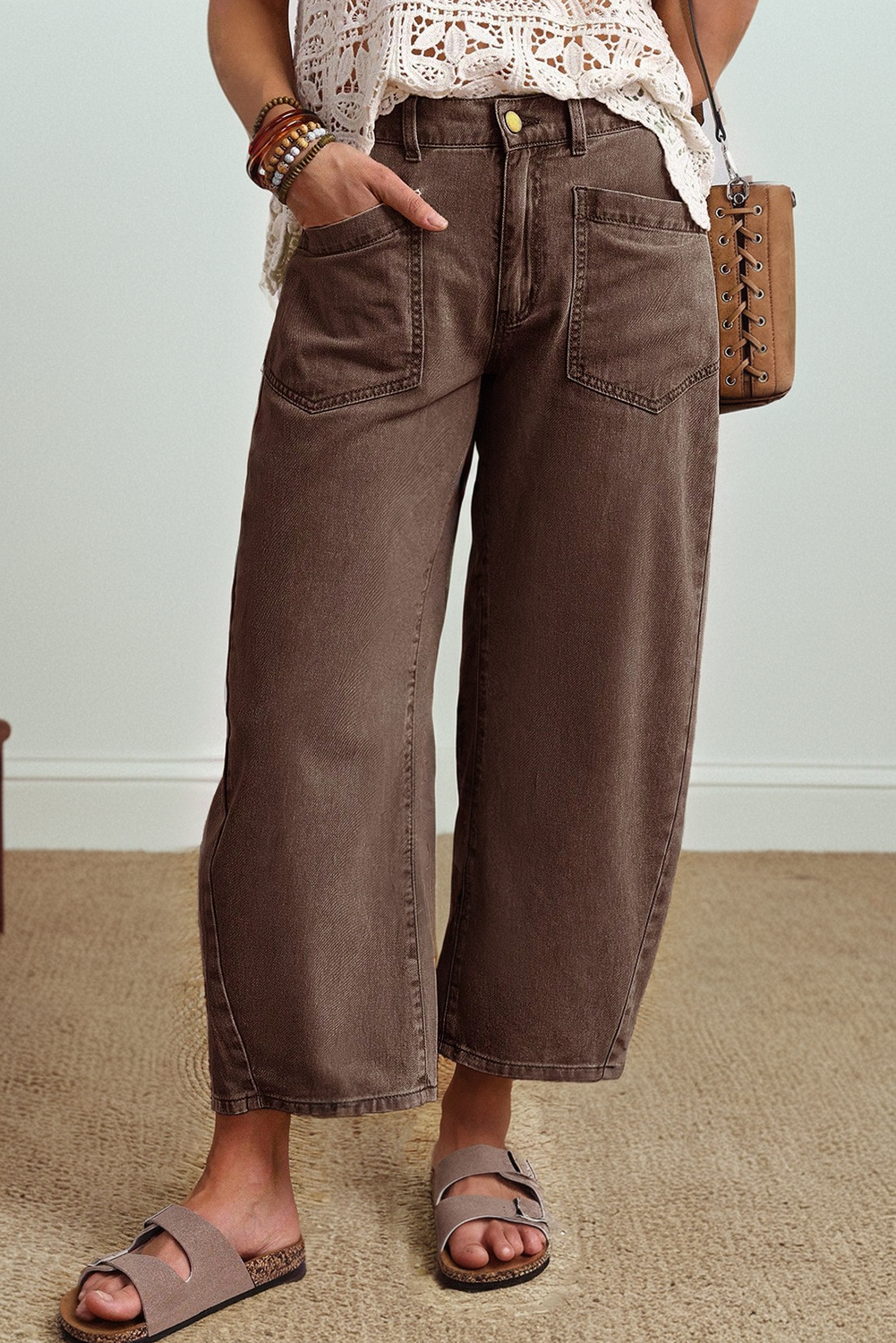 Brown barrel jeans patch pocket close up