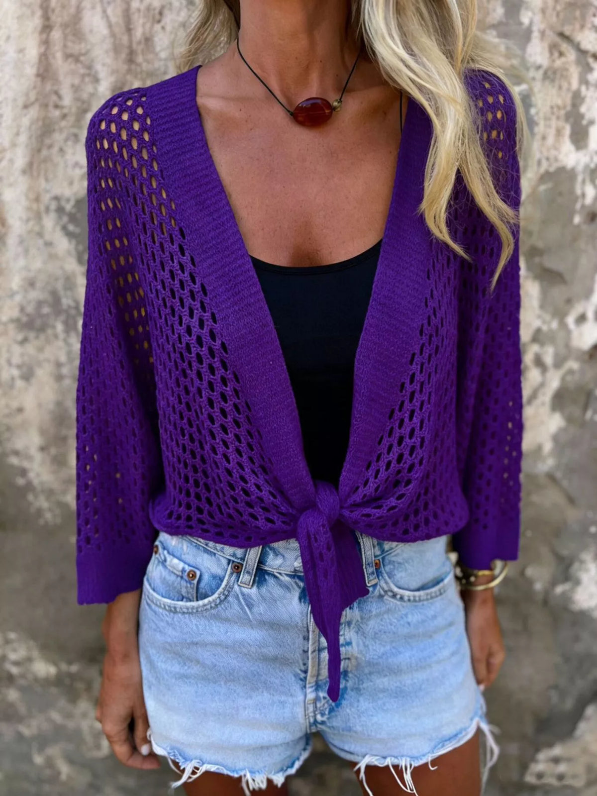 Crochet cover up worn on the beach