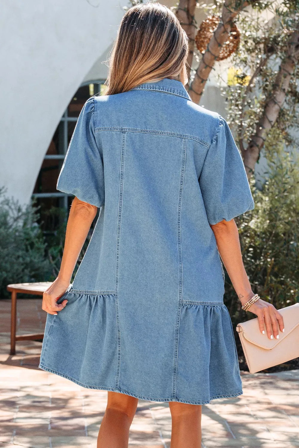 light wash puff sleeve ruffle hem denim dress side view