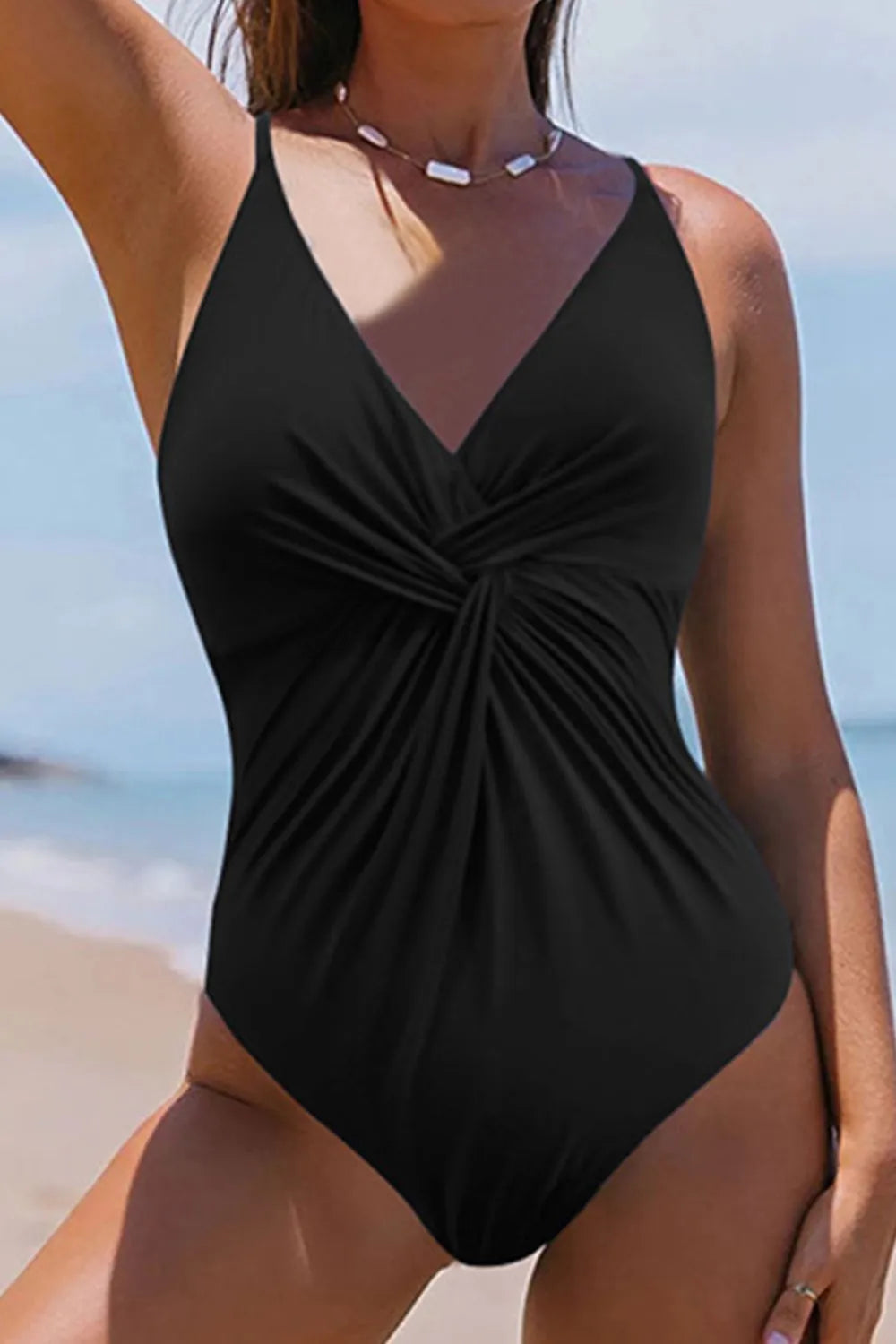 Crisscross one piece swimsuit side view