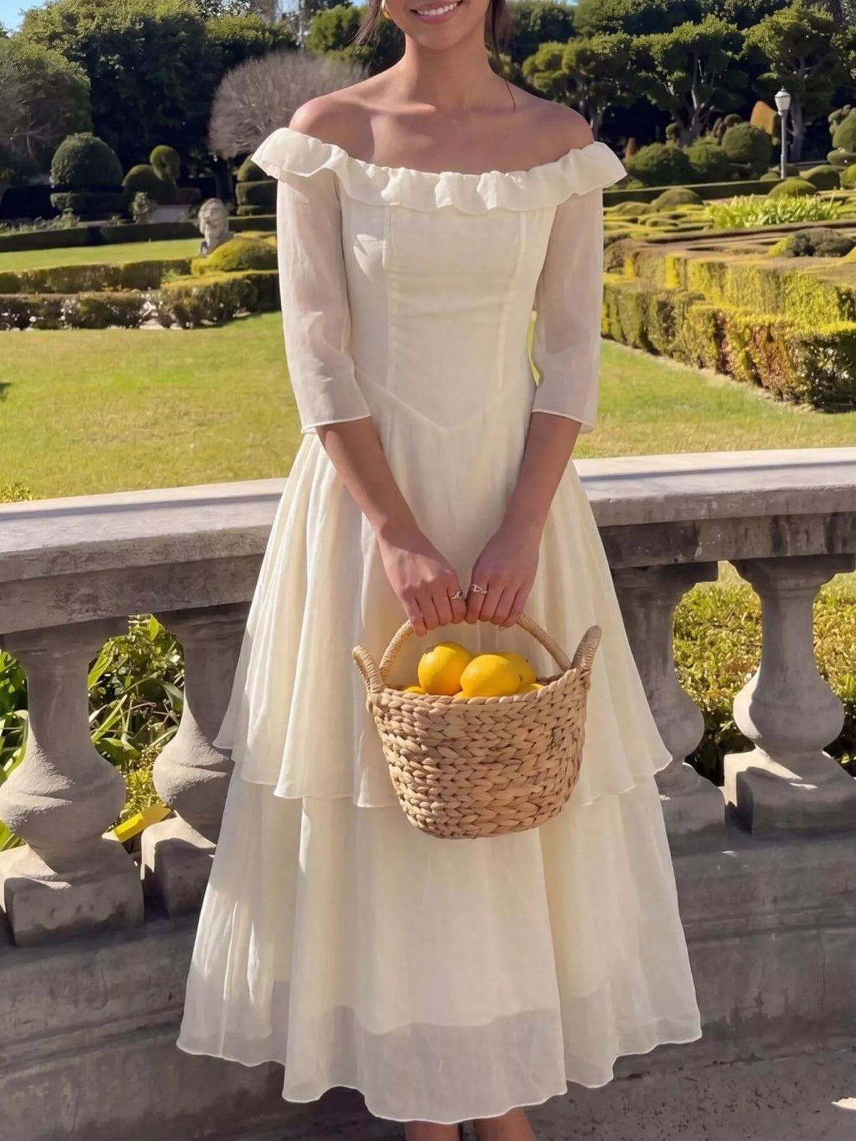 Cream off shoulder midi dress back view