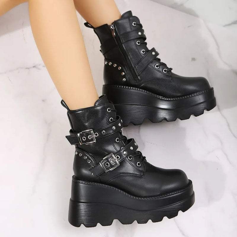 Black faux leather wedge boots with side zip front view
