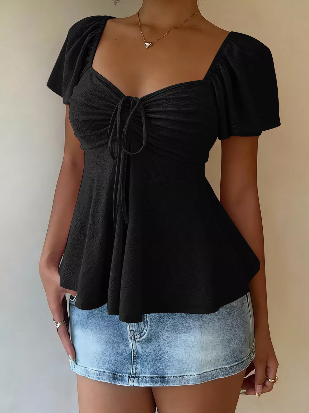 Flutter sleeve top shown in a sky blue shade