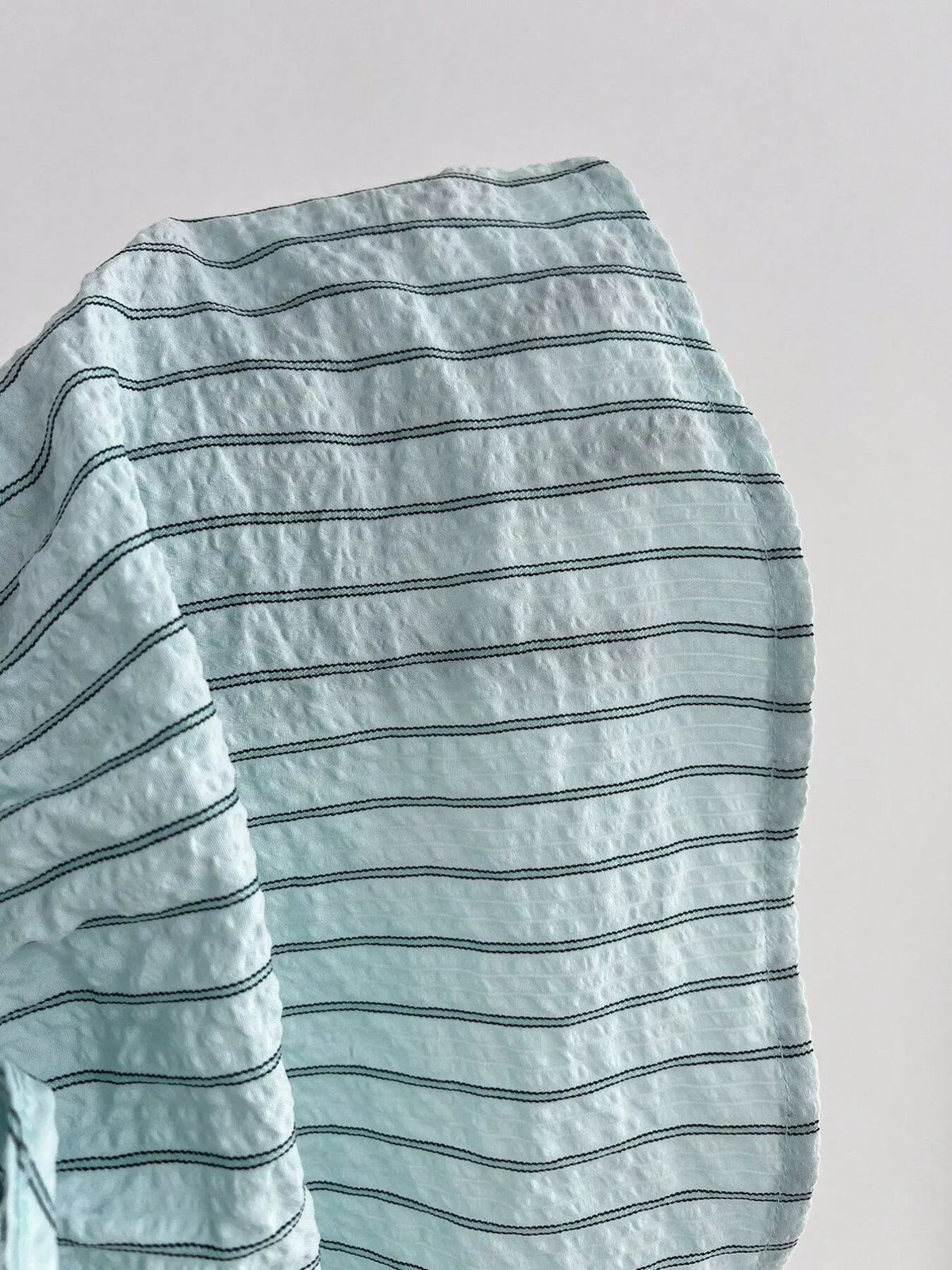 Tie front ruffle detail on cami