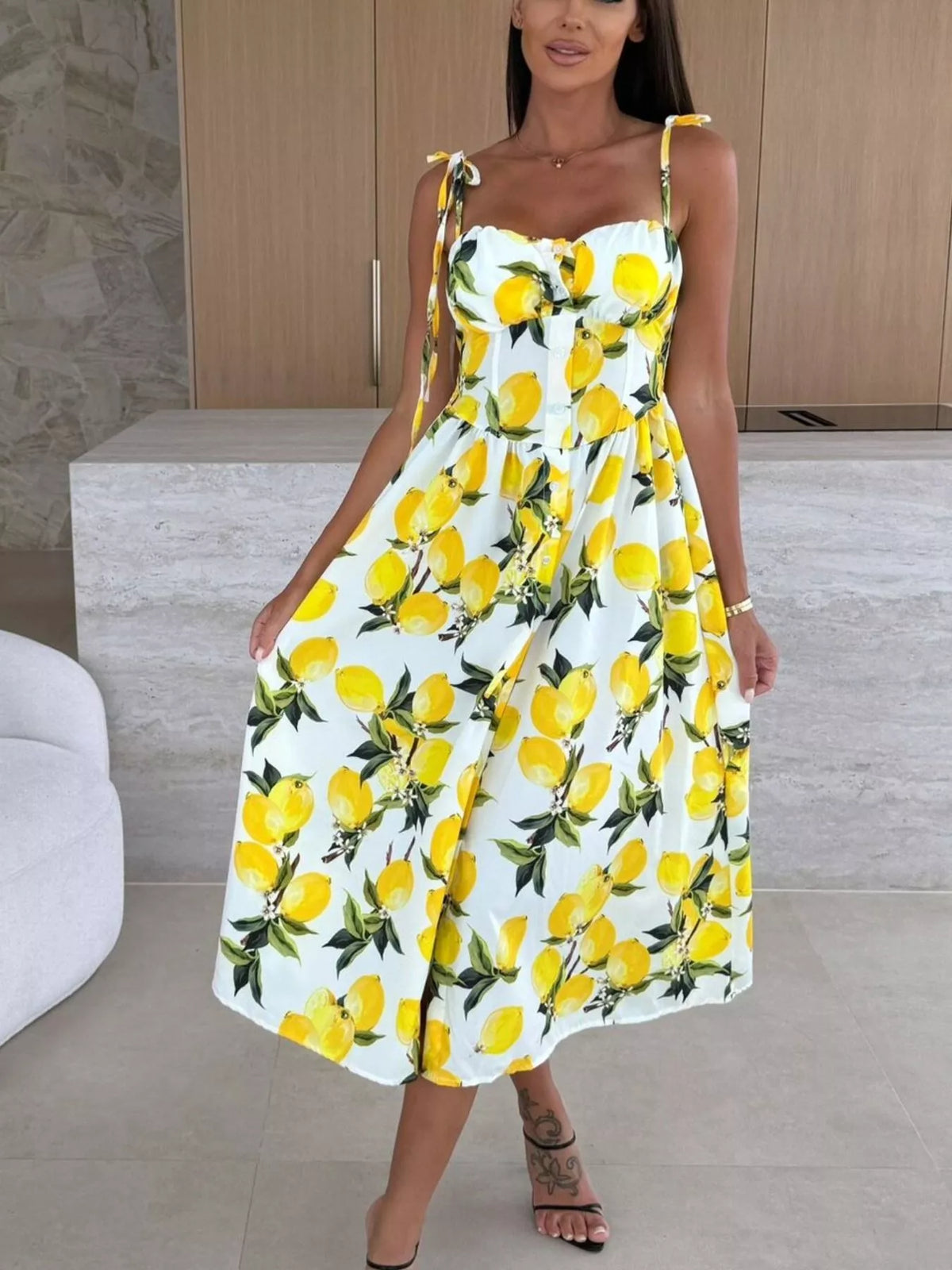 Printed tie strap midi dress flat lay view