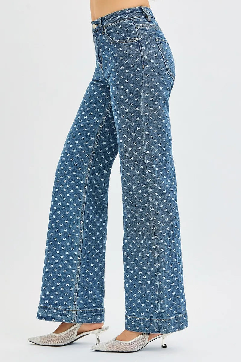 Close up of bow embroidery detail on RISEN jeans