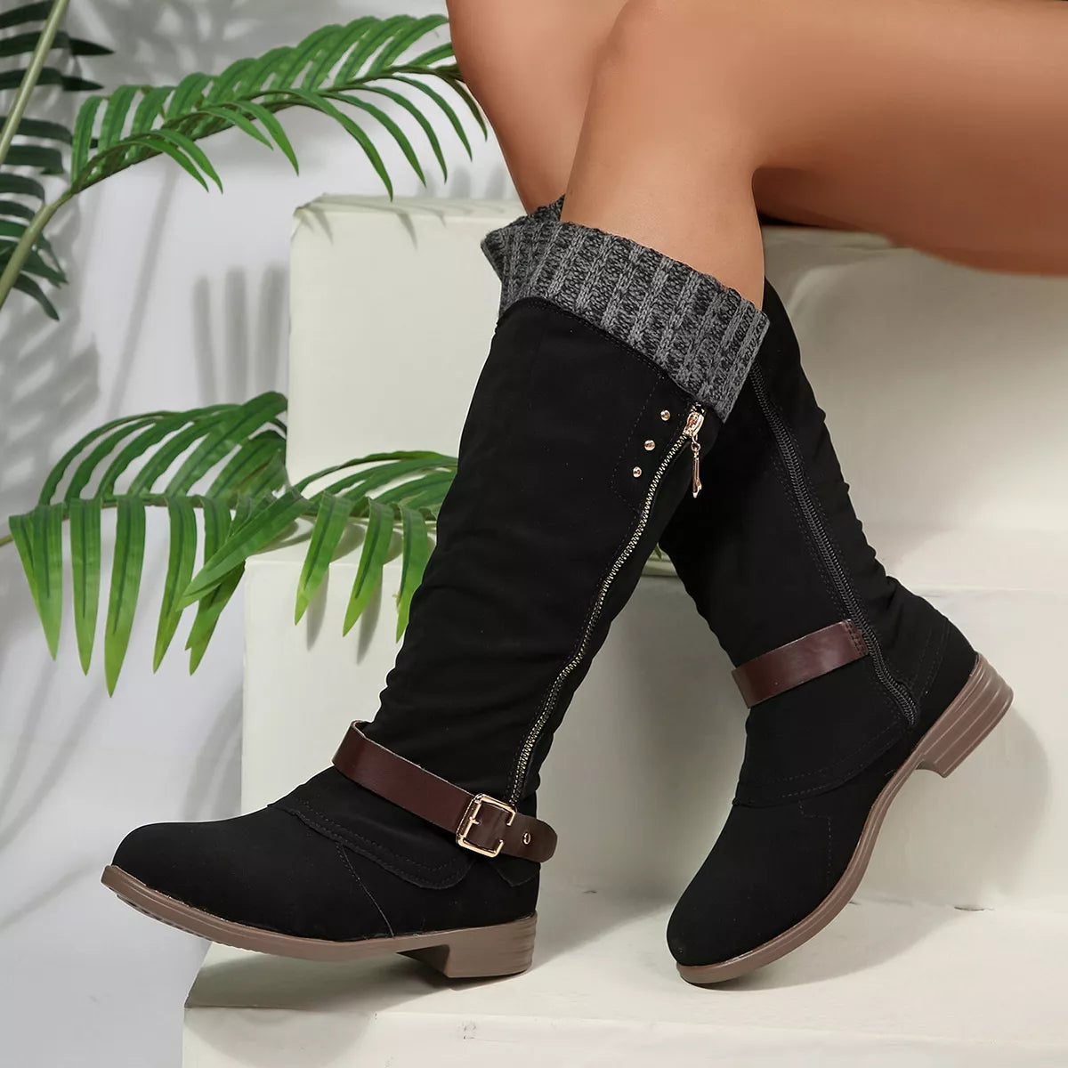 Black round toe block heels boots side profile view
