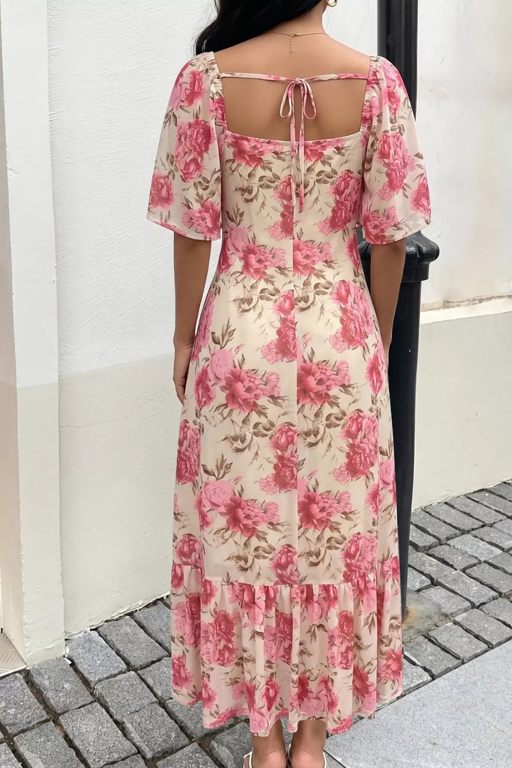 Floral flutter sleeve dress fabric close up