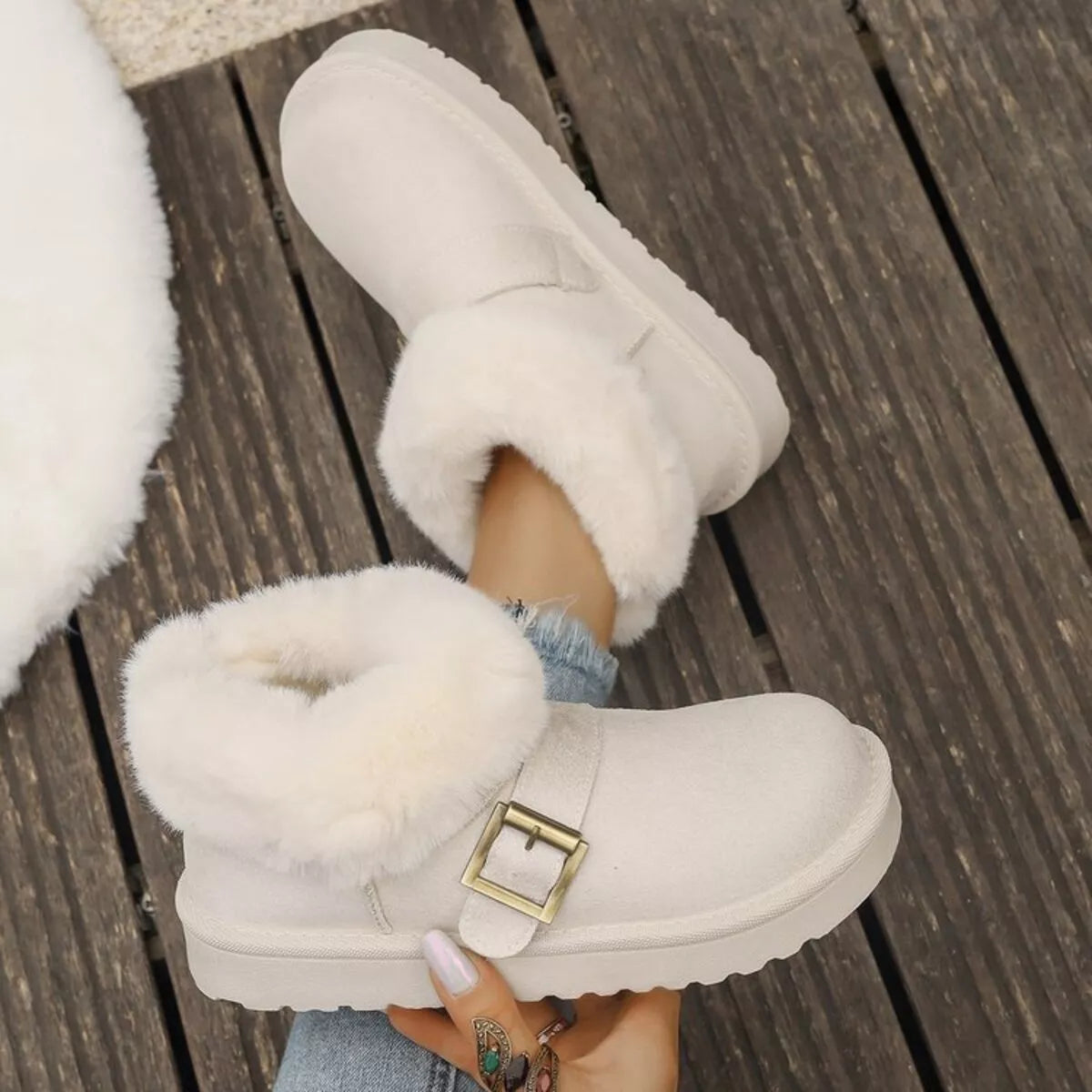 fuzzy trim buckle winter boots flat lay