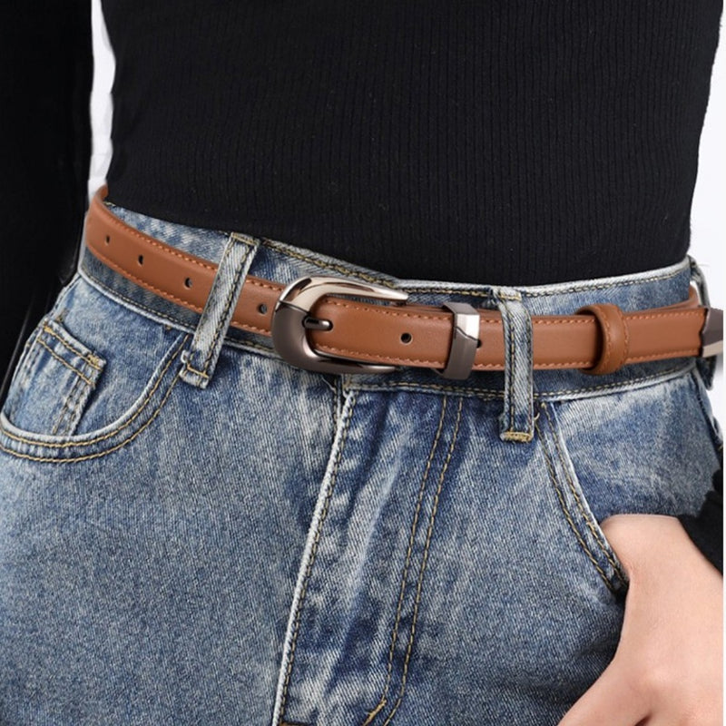 Metal buckle leather belt coiled flat