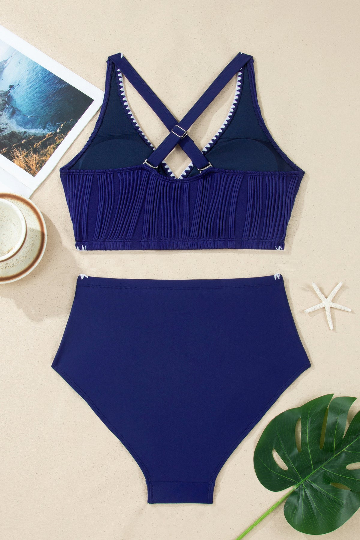 Navy blue textured bikini fabric close up