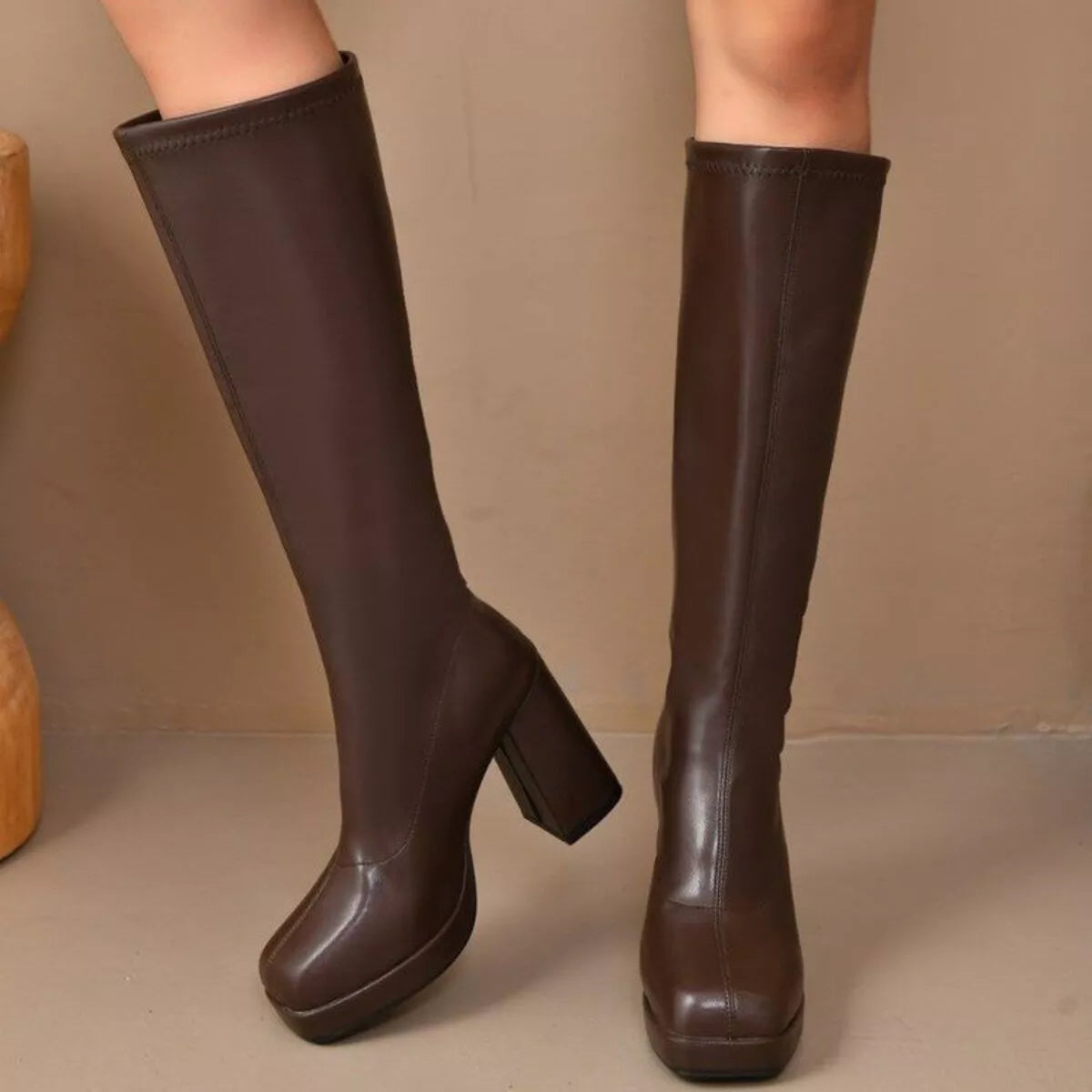Brown square toe block heel boots front view