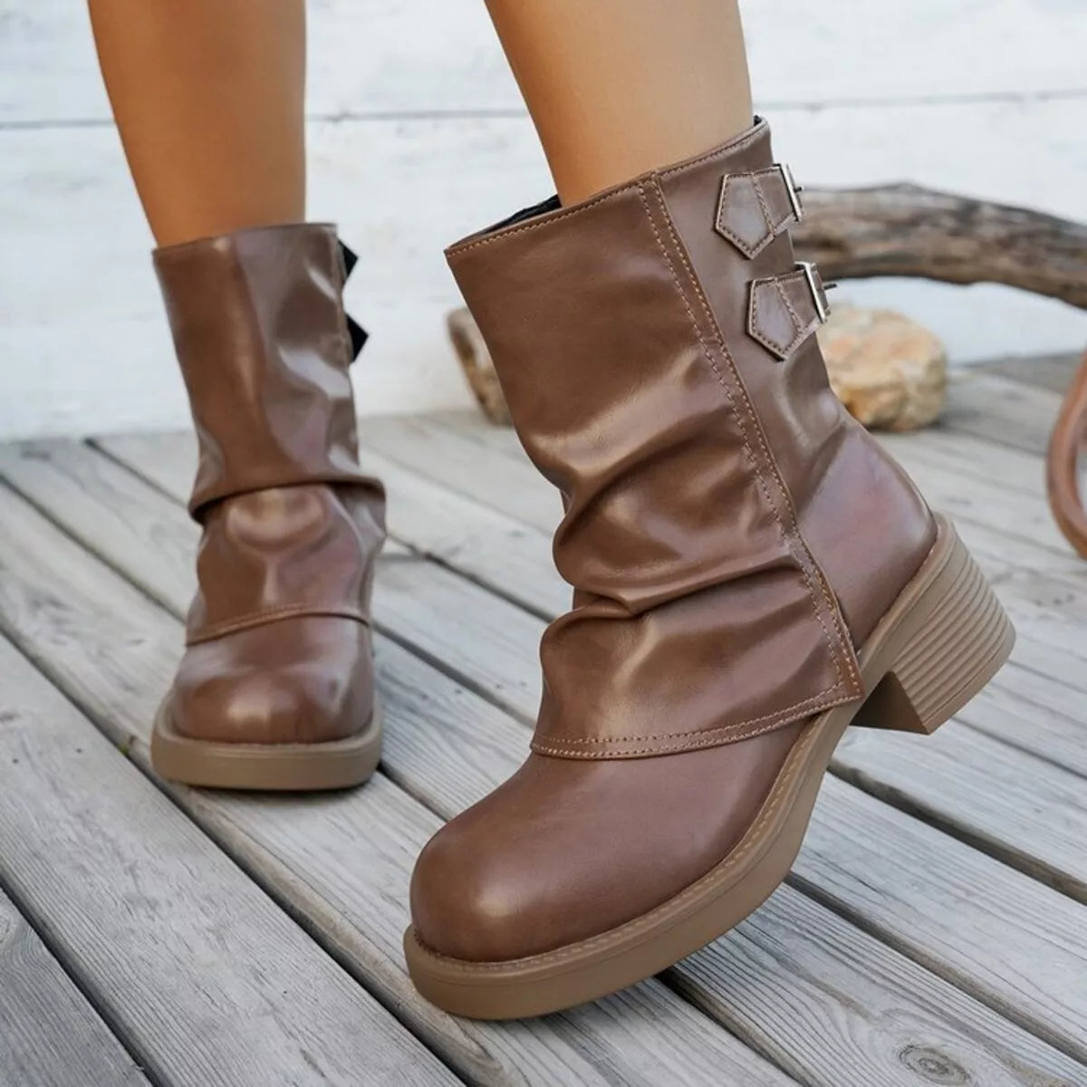 Round toe low block heel boots side profile