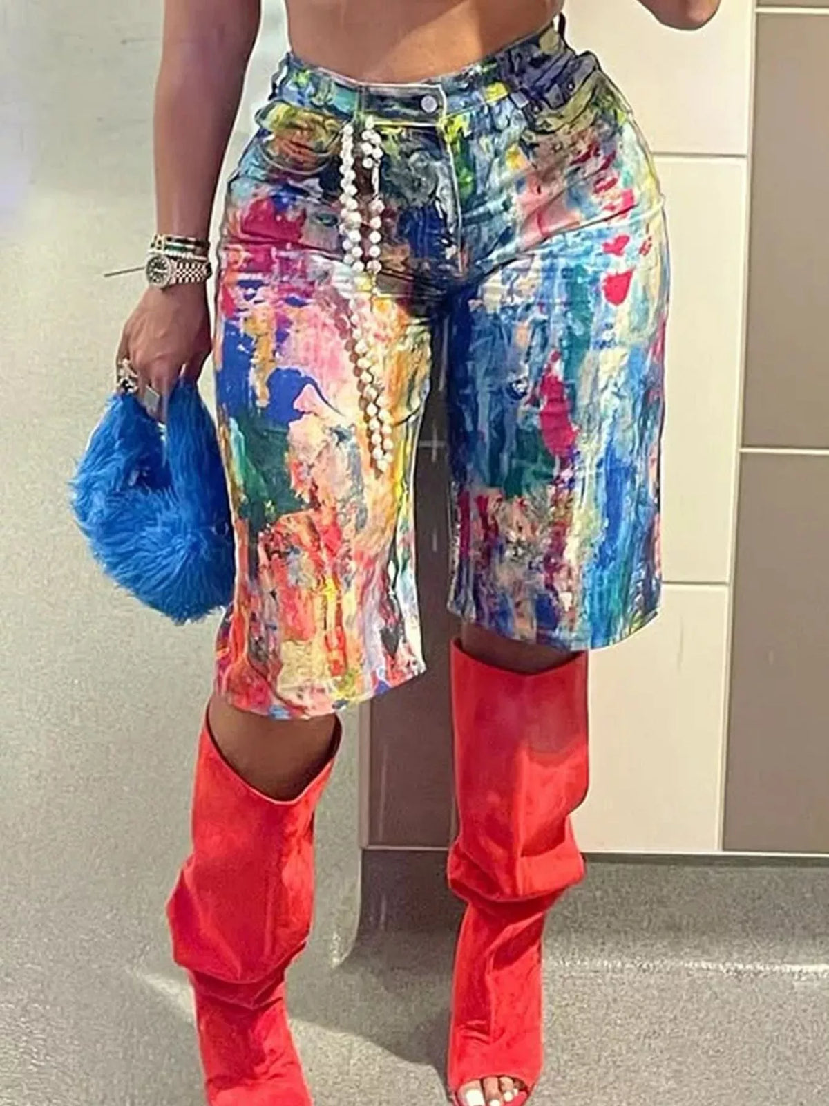 Front view of the splash print shorts on a model