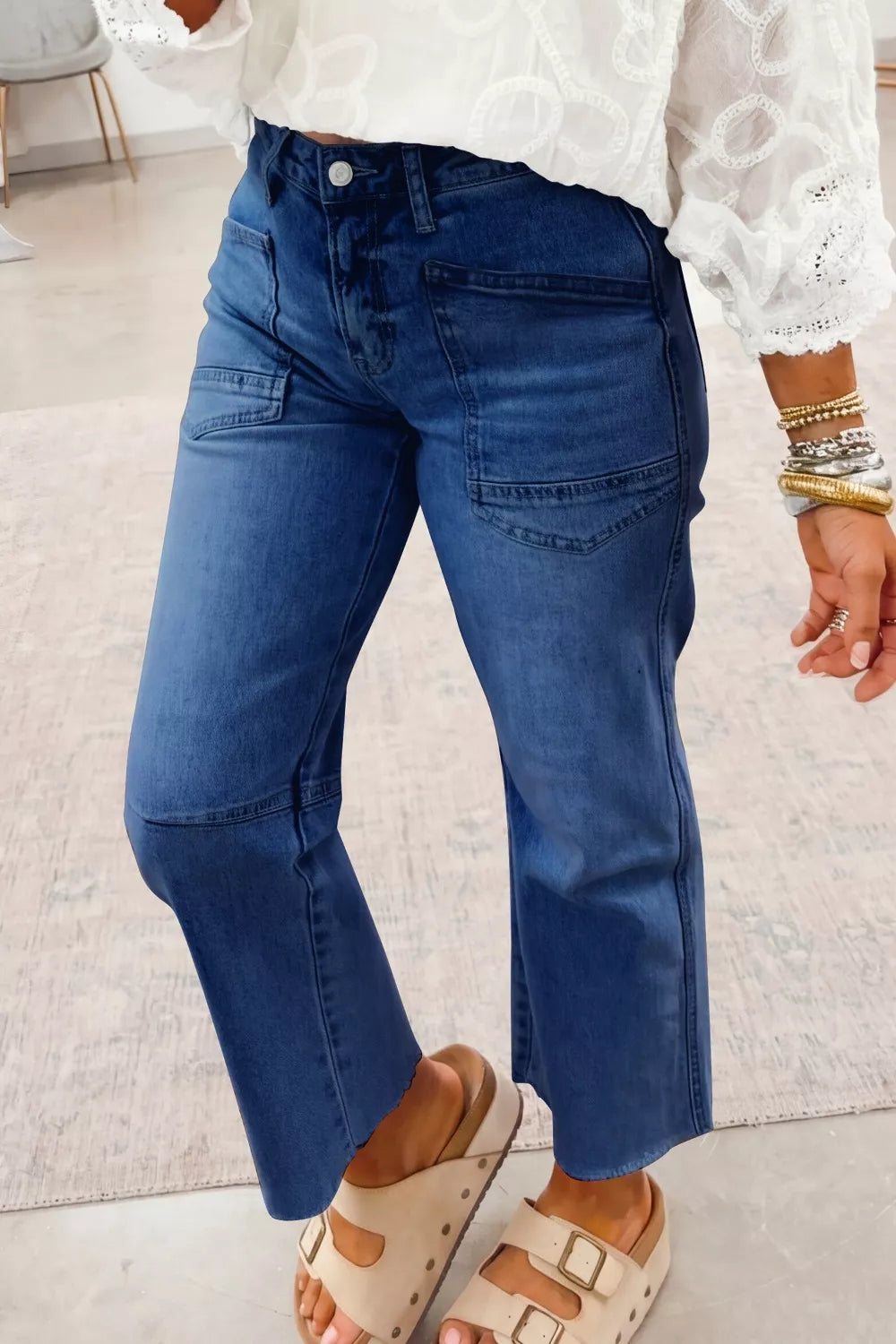 Dark blue straight leg jeans raw hem detail
