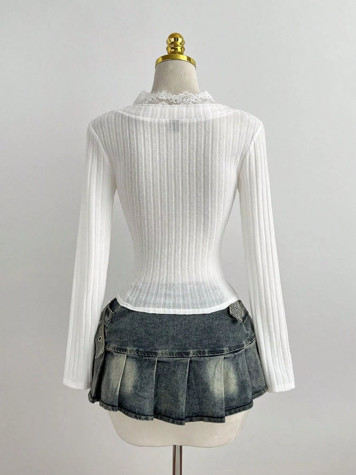Fitted ribbed knit top shown from the side