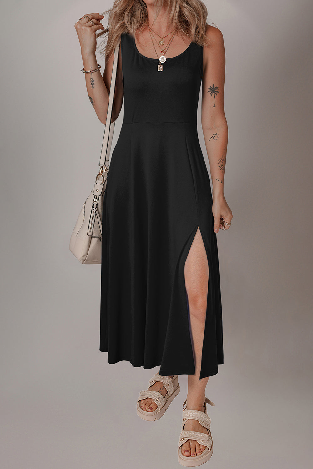 Black solid color sleeveless dress styled outfit view