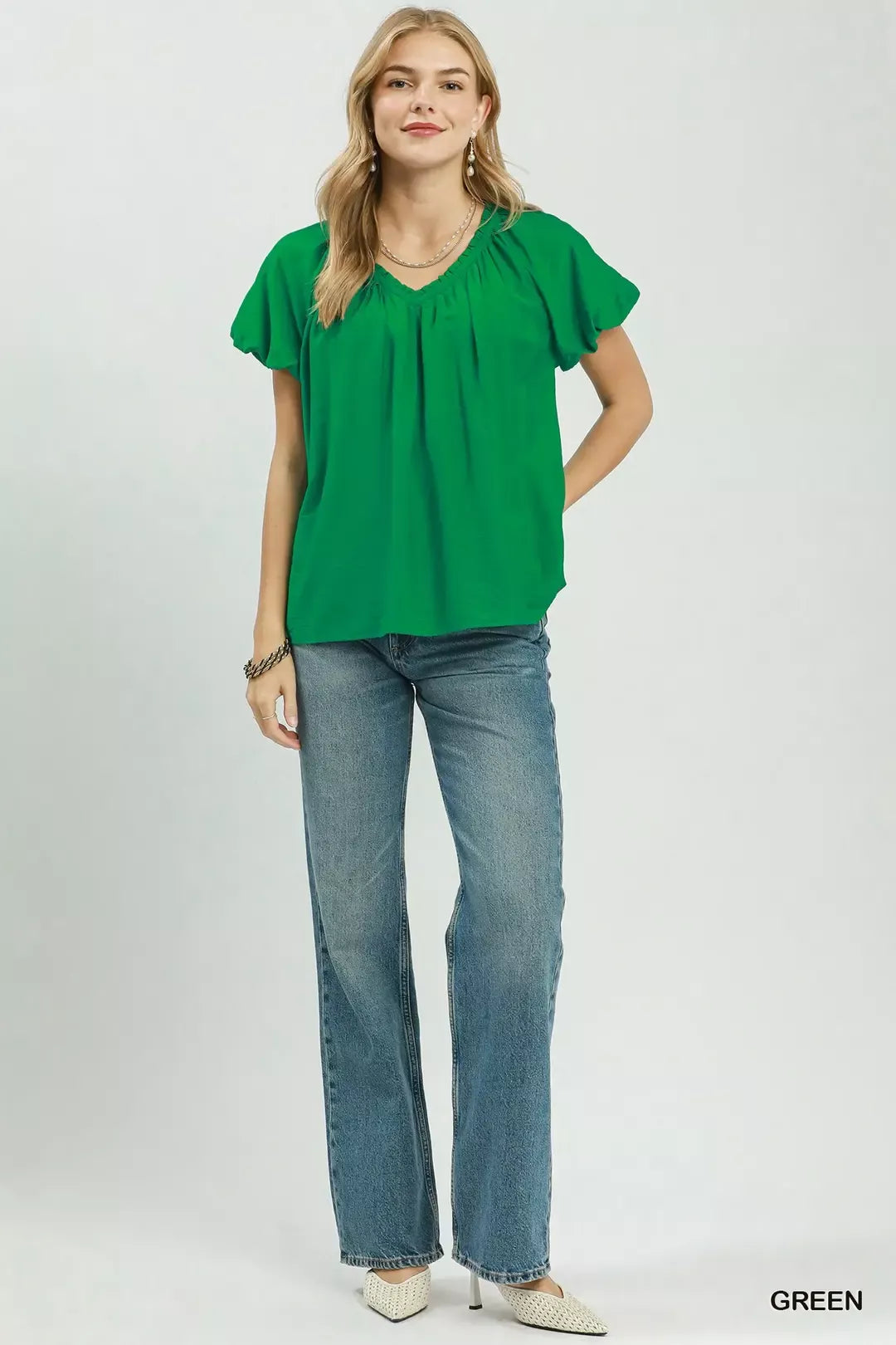 green gathered V neck top styled look