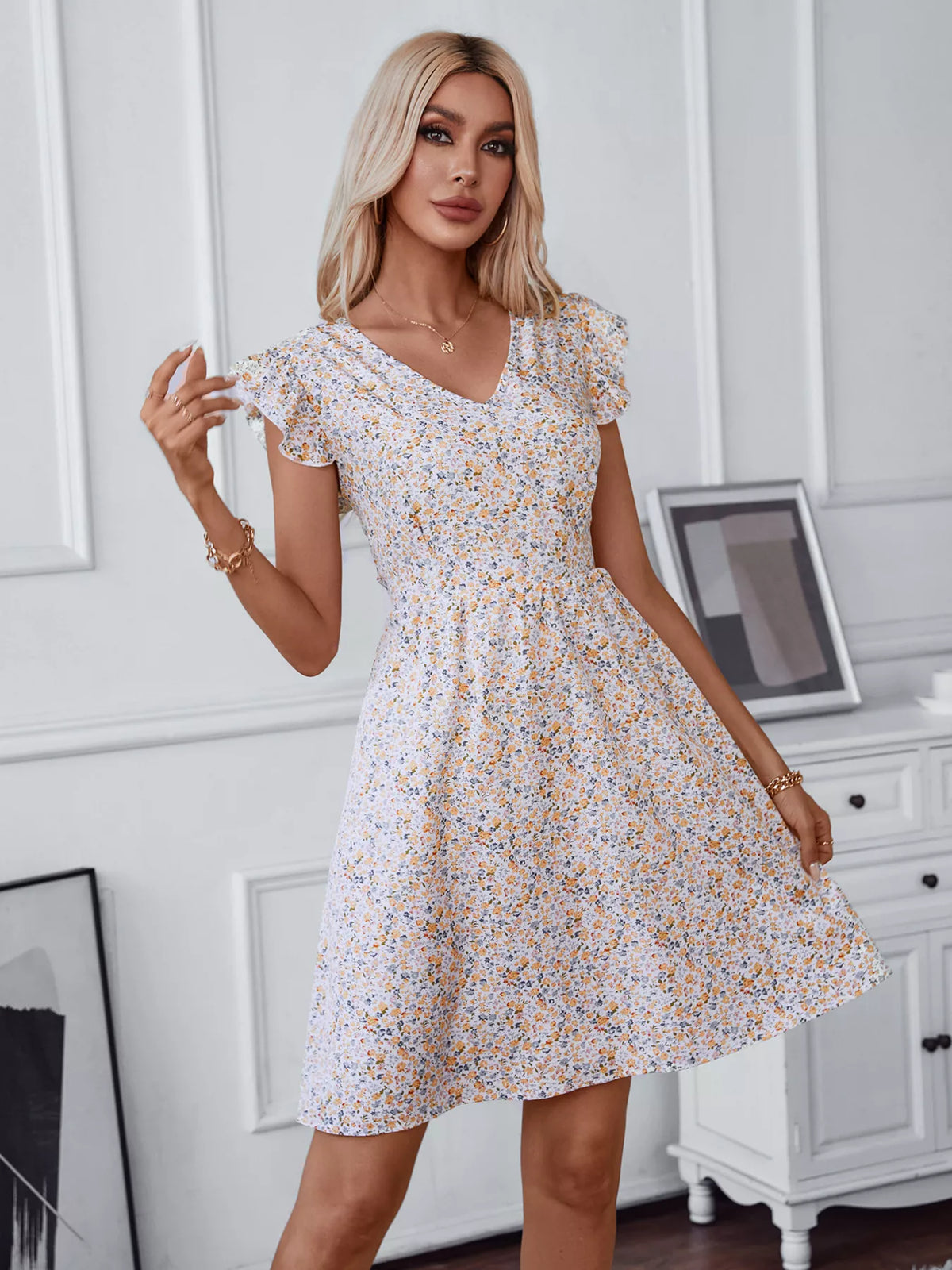 Floral dress shown at a side angle