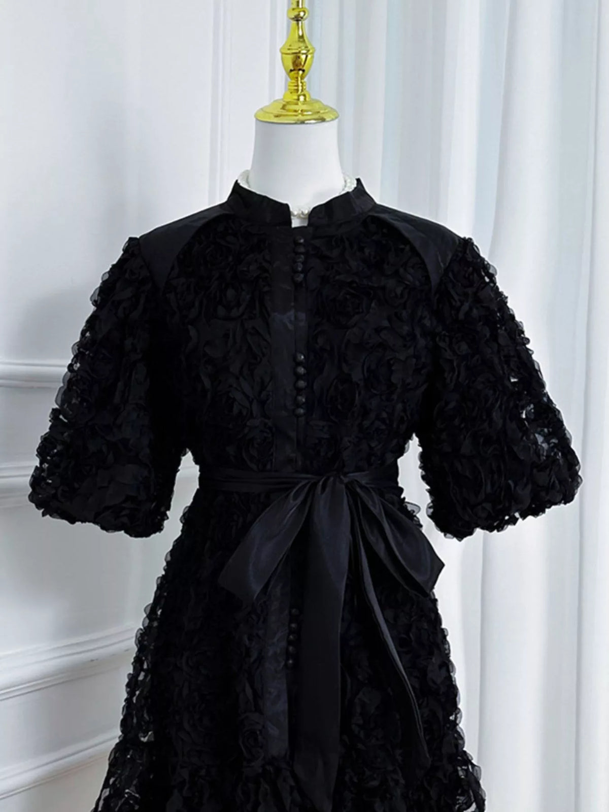 Puff sleeve detail on embellished dress