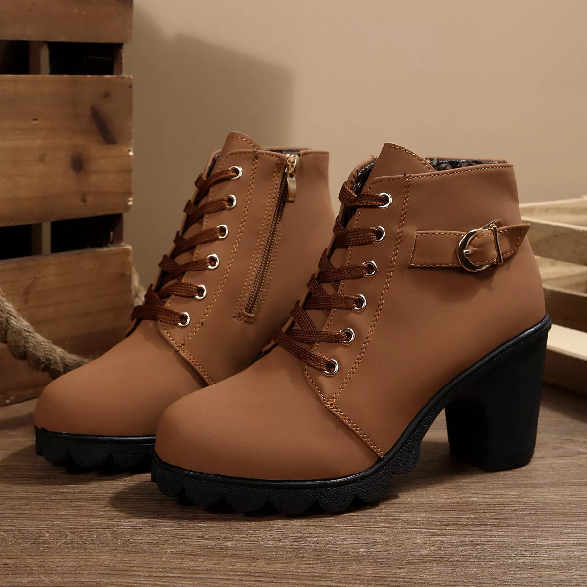 Lace up block heel suede boots detail of the upper