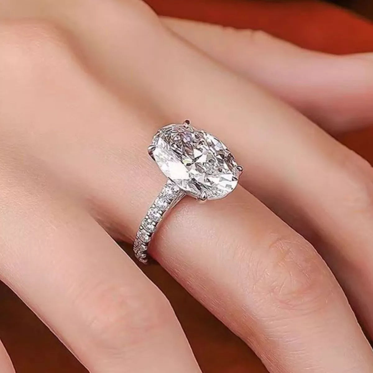 Sterling silver oval moissanite solitaire ring side view