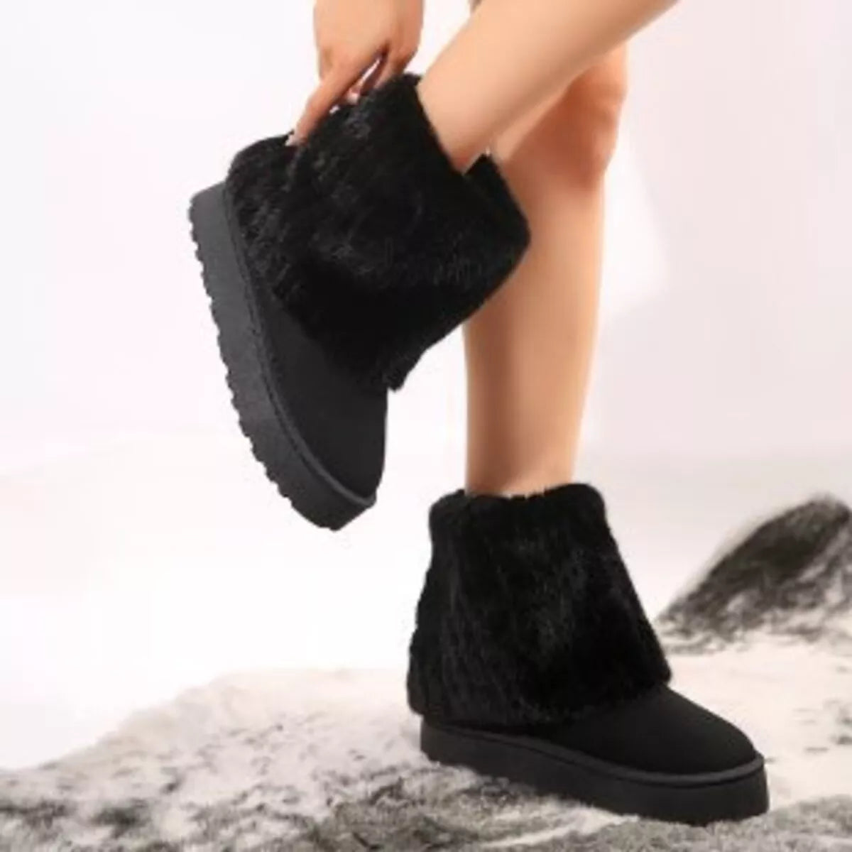 Fuzzy round toe platform boots toe close up